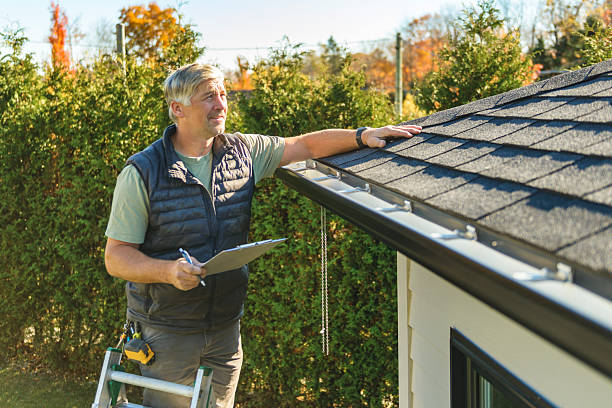 Professional Hail Damage Roof Repair technician working in Riverside, AL